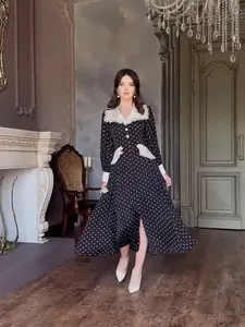 Elegant black polka dot midi dress with white lace doll collar and slim fit silhouette