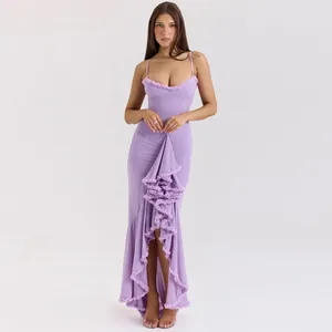 Detailed studio shot of a lavender spaghetti strap maxi dress with elegant ruffled skirt