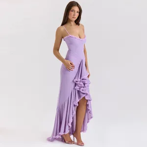 Close-up detail of purple ruffled camisole maxi dress with high-low asymmetrical hem