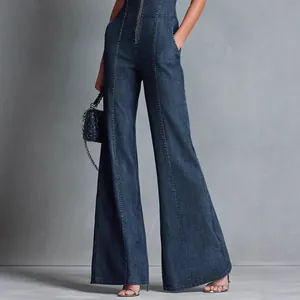 Chic vintage dark blue denim jumpsuit featuring a front zipper and wide-leg design