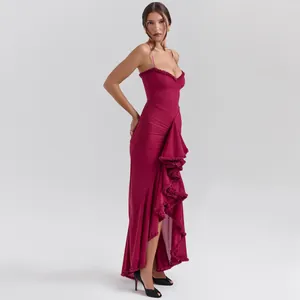 Elegant burgundy sleeveless spaghetti strap maxi dress with asymmetrical ruffled hem