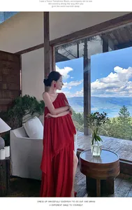 Elegant red one-shoulder pleated maxi dress featuring a high slit for resort and vacation wear