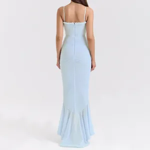 Back view of an elegant light blue spaghetti strap maxi dress with ruched detail