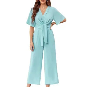 Elegant light blue V-neck short-sleeved jumpsuit with front tie knot and wide legs