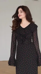 Elegant black chiffon maxi dress with red cherry print and ruffle sleeve details