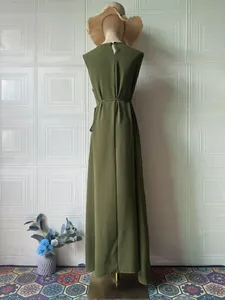 Elegant olive green sleeveless maxi dress for summer featuring a belted waist detail