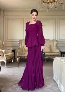 Elegant purple long-sleeved evening dress with 3D floral accents and peplum waist