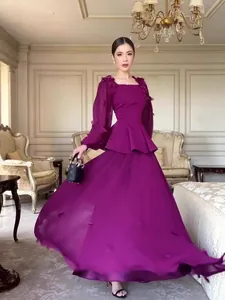 Elegant purple two-piece long-sleeved peplum top and maxi skirt set for vintage fall style