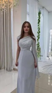Full view of elegant light blue one-shoulder silky maxi dress worn by a model