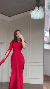 Elegant one-shoulder long red silk dress for formal evening events and galas