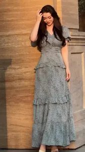 Elegant vintage floral V-neck maxi dress with tiered skirt and cinched high waist