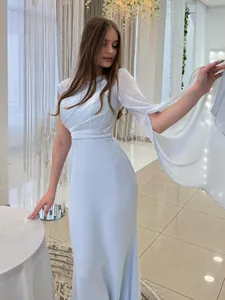 Elegant light blue silky long dress with flowing cape sleeve and pleated waist