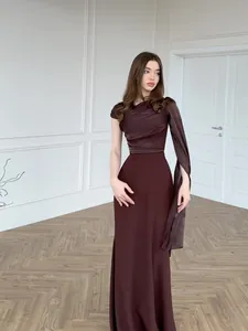 Elegant chocolate brown silky maxi dress with asymmetrical flowing sleeve and slim fit design
