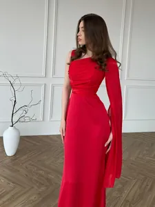 Elegant red one-shoulder maxi dress featuring a draped silky cape sleeve for gala events