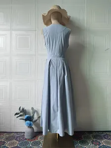 Back view of an elegant light blue sleeveless V-neck maxi dress displayed on a mannequin