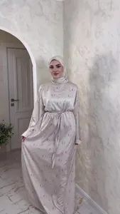 Elegant beige floral print modest maxi dress with long sleeves and a matching hijab set