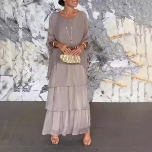 Elegant layered chiffon maxi dress set in soft mauve with subtle sheen details