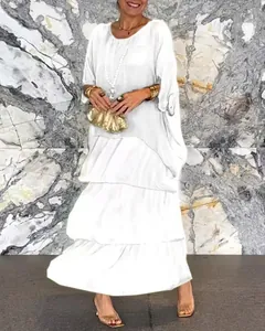 Elegant women's white tiered maxi dress featuring a bohemian loose fit summer style