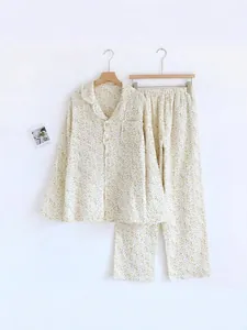 Two-piece floral print cotton gauze pajama set for women featuring long sleeves and pants