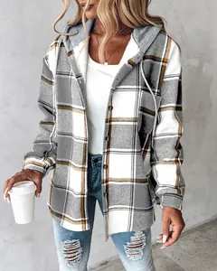 Close-up of a women's grey plaid hooded jacket with button closure for winter fashion