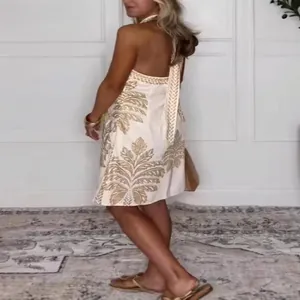 Elegante abito bianco all'americana con stampa palme dorate e dettaglio fiocco