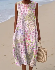 A graceful sleeveless floral print maxi dress perfect for a sunny beach vacation look