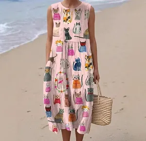 Detail of sleeveless pink casual long dress featuring cute cat prints on beach setting