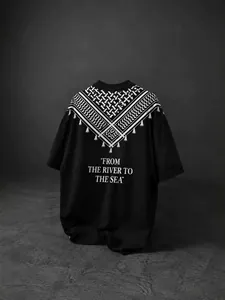 Black oversized short-sleeve T-shirt featuring Keffiyeh patterns and slogan on back