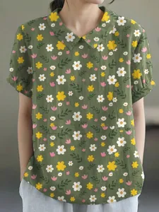 Detail view of green floral short sleeve blouse with lapel collar and casual loose fit