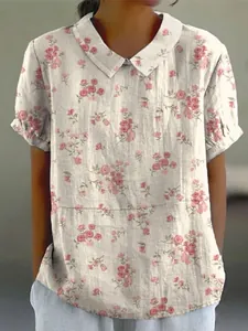 Floral print short sleeve blouse with a Peter Pan collar, casual linen-like summer top.