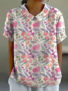 Close-up of floral print short-sleeved top with lapel collar and loose casual fit