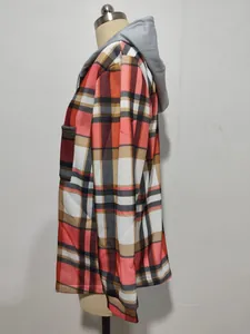 Detailed side view of a red and orange plaid hooded jacket for women on mannequin