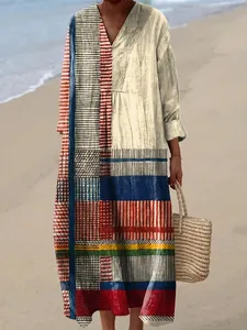 Boho chic loose V-neck maxi dress with geometric patchwork print and long sleeves