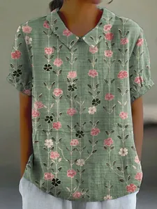 Women's loose casual short sleeve blouse featuring a vintage floral print and lapel collar
