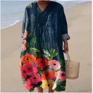 Close-up detail of the vibrant floral print on this loose V-neck long sleeve maxi dress