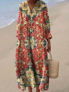 Bohemian loose V-neck maxi dress with ethnic floral print in vibrant red for beach vacations.