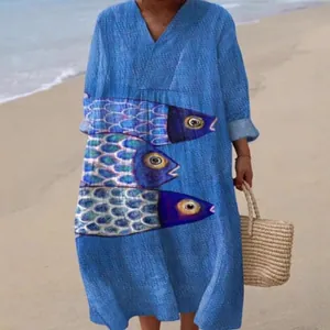 Casual loose V-neck long-sleeved maxi dress with artistic blue fish print on beach