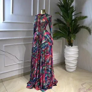 Detailed view of long sleeve maxi dress with colorful abstract mesh tie-dye print