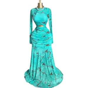Elegant turquoise mesh dress with marble print, waist cutout, and ruched mermaid hem