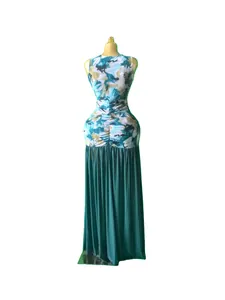 Elegant sleeveless maxi dress with tie-dye print bodice and pleated teal skirt