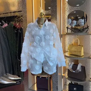 Elegant white organza two-piece set featuring 3D rose floral appliques on shirt and shorts