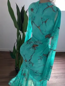 Turquoise mesh long sleeve fishtail dress with branch print for formal party events.