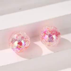 Macro detail of 16mm cracked iridescent beads for handmade DIY jewelry crafting projects