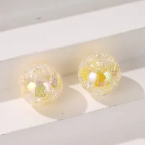 Detailed macro view of 16mm colorful crackle beads for DIY jewelry making and craft projects.