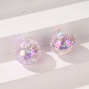 Detailed macro view of 16mm iridescent crackle beads with vibrant purple and pink hues