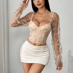 Close-up detail of sexy floral embroidered sheer mesh corset top with underwire support