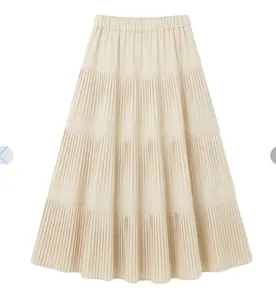 Falda midi evasé de punto plisado a capas beige de calidad con cómoda cintura elástica
