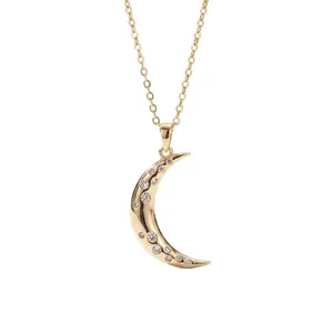 Elegant gold crescent moon necklace with sparkling rhinestones for women, chic style.