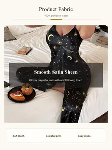 Women's black satin pajama set featuring golden moon and star celestial prints