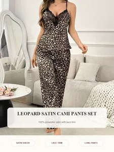 Leopard print satin camisole and pants set featuring elegant black lace trim detail.